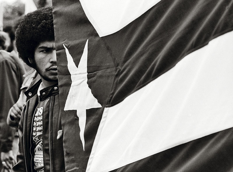 Young Man With Puerto Rican Flag, Photograph